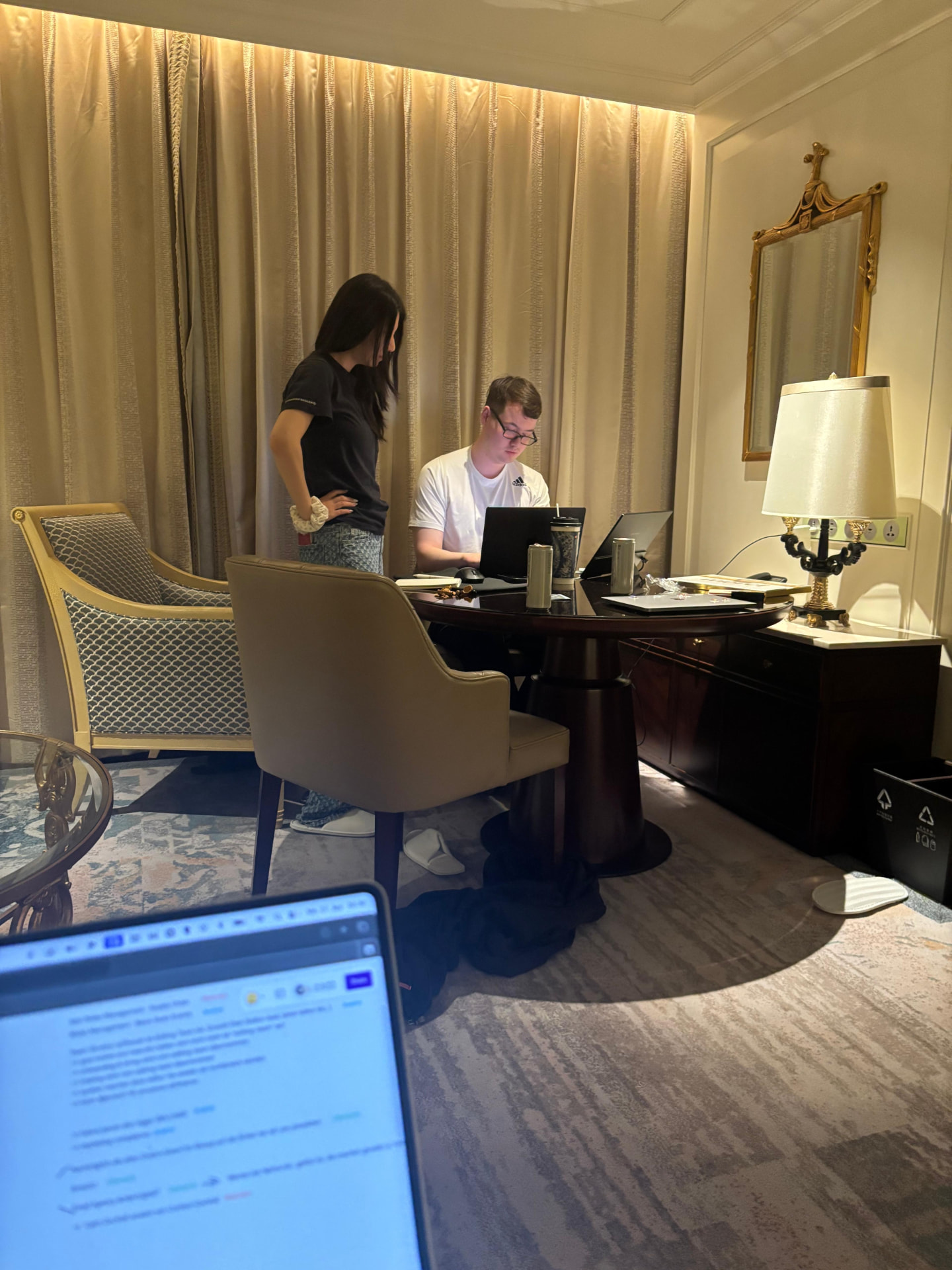 Late-night working session in a hotel room