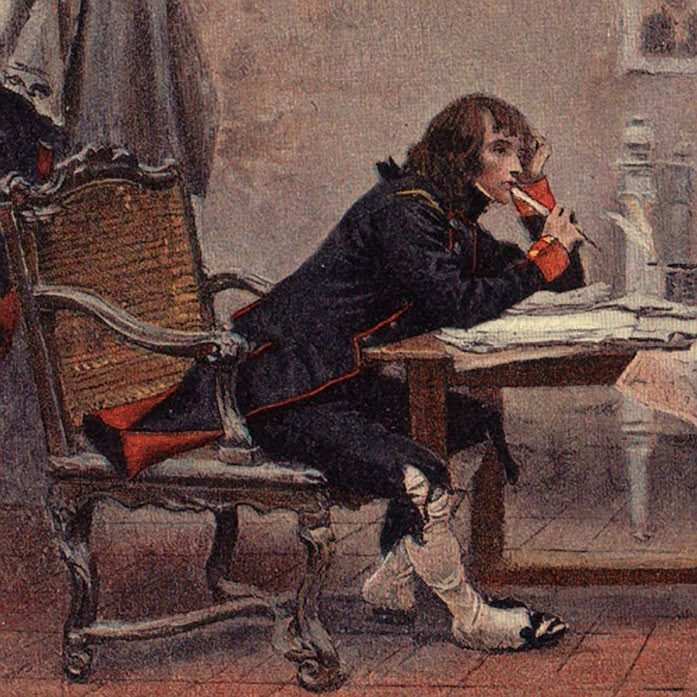 Painting of a young Napoleon writing at his desk