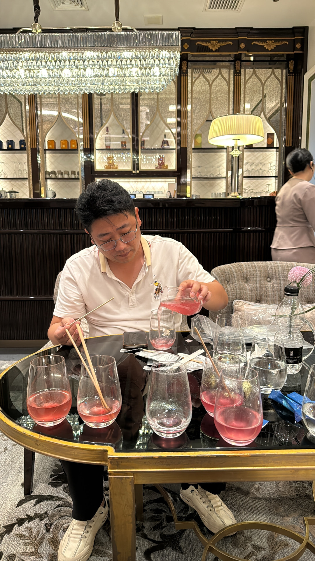 Founder pouring a sample during a tasting session