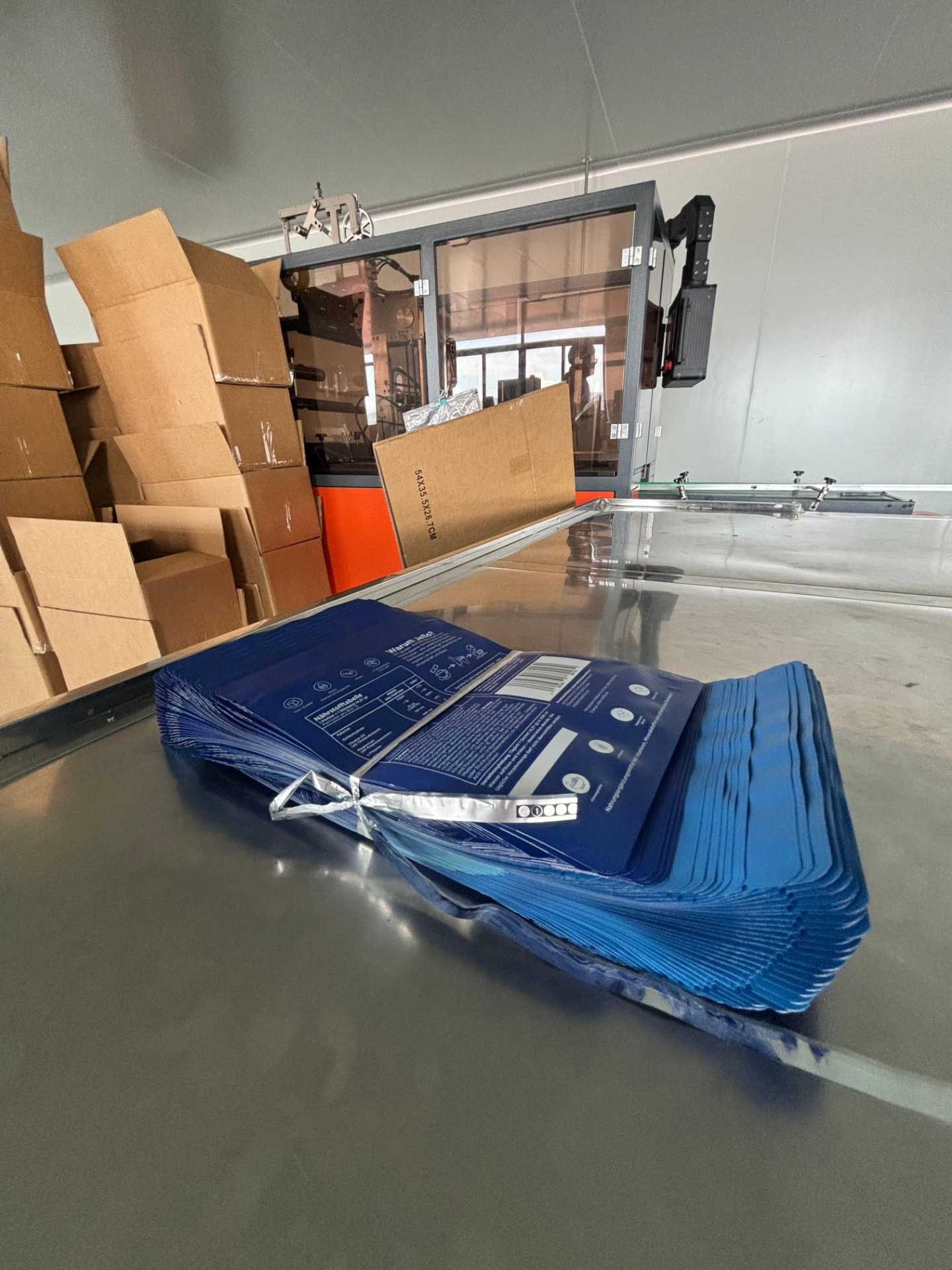 Freshly printed Jello sachets at the production line